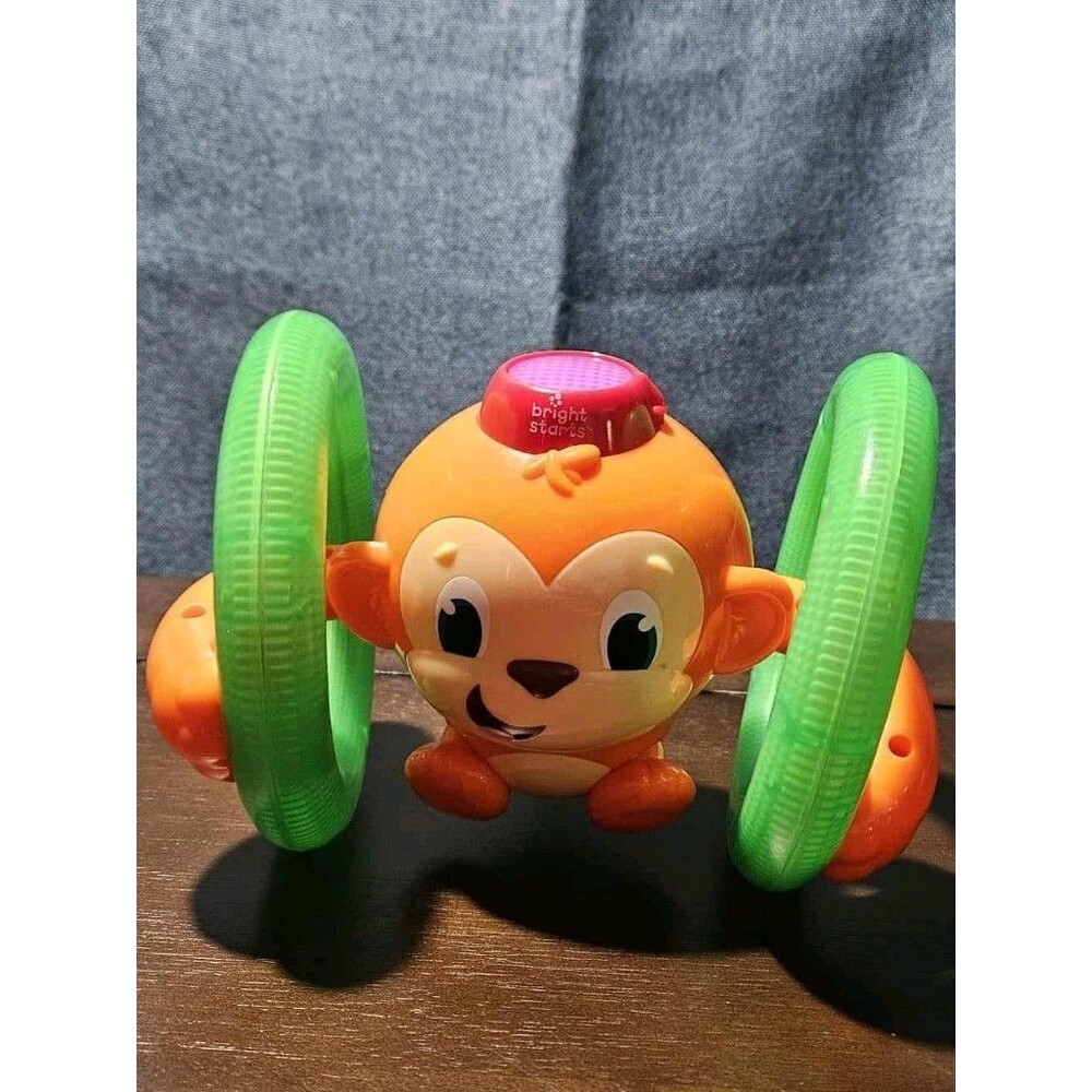 Bright Starts Roll & Glow Monkey | Musical Light Up Crawl Toy | Tummy Time Toy